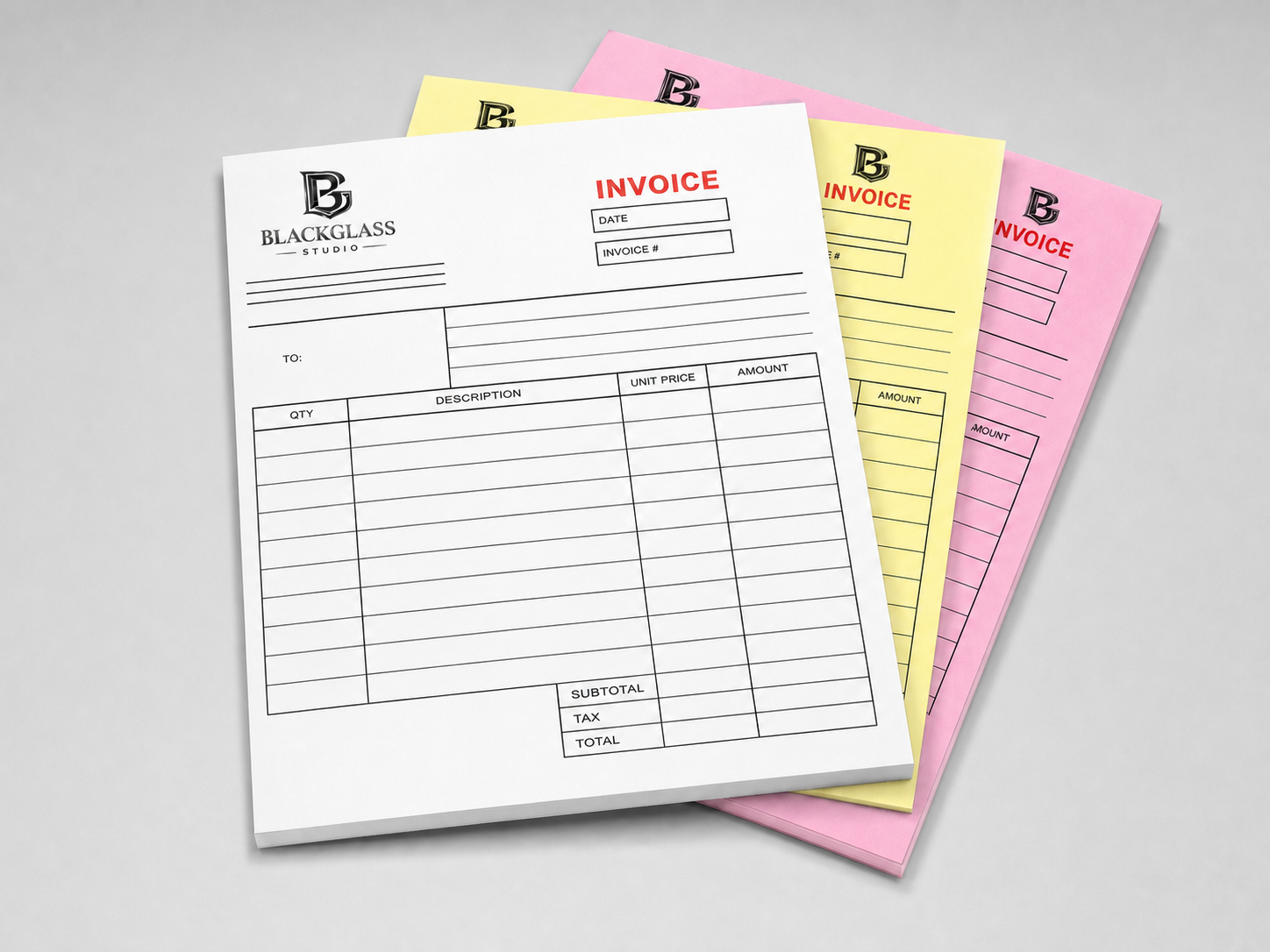 Three-part NCR invoice forms branded with the Black Glass Studio logo